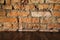 Old dirty interior with brick wall, vintage background