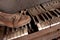 Old Dirty Piano With Old Leather Shoe