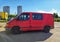 Old dirty red van Ford Transit parked