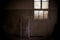 old dirty room in abandoned psychiatric hospital building. dirt and disorder on social facilities. broken window