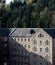 Old Disused Mill Building at New Lanark Village Scotland in Autumn Sunlight