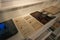 Old documents in the wooden boxes with glass lids at the National Immigration Museum of Buenos Aires