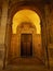 Old door in arcades of Bologna, Emilia-Romagna, Italy