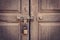Old door knock and key lock wall texture and background