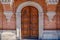 Old door in Russian style. Vintage door of Igumnov house. Ancient mansion, old palace in center of Moscow city, Russia. French