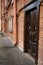 Old door in rustic brick wall, Saint Petersburg, Russia