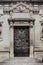 Old door in the square of the famous basilica Church of the Holy Cross. Italy