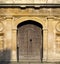 Old door to Cambridge College. UK