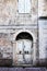 Old door and window on a stone Mediterranean house