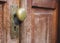 Old Doorknob with keyhole on wooden door