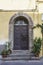 An old doorway in the city of Lucca, Tuscany, Italy