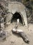 Old Drain Pipe on California Beach with Debris