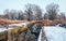 Old drainage canal and swampy meadow in early spring