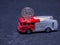 Old dusty fire truck toy car with coin on it`s roof - coin are Czech koruna