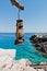 Old dusty and rusty lantern above boat dock near Marmara beach, island of Crete