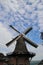 Old dutch windmill in villagye named Oldebroek with name De Hoop, still working as peel and as grind mill.