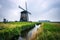 Old dutch windmills in cold morning scenery near Amsterdam