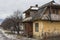 Old dwelling house in the Carpathian village of Yaremche in winter. Ukraine