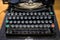 Old electromechanical typewriter closeup photo