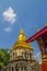 Old elephant chedi with golden top pagoda at Wat Chiang Man or Wat Chiang Mun, the oldest temple in Chiang Mai, Thailand, built in