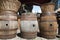 Old empty wooden cider casks used as bar tables and decorative articles