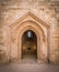 Old entrance in Castel del Monte, famous medieval fortress in Apulia, southern Italy.