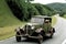 Old european car driving on a country road