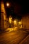 Old European city illuminated street at night, Lisbon, Portugal