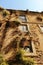 Old facade with plants in the street of Lisbon