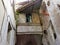 Old facade of a public housing in the historical center of Salerno in Italy.