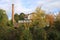 Old factory Schoenau surrounded by colorful trees