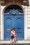 Old faded blue door in Lille, France