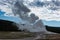 Old Faithful erupting in Yellowstone National Park Wyoming