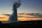 Old Faithful geyser at dusk, Yellowstone