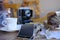 old family photos, empty base, stack of old family vintage photographs of 50s, 40s, black retro accordion camera on wooden table,