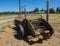 Old farm equipment at vineyard