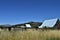 Old farm house and barn in a remote valley of Idaho