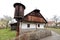 Old farm house with wooden gable and large dove-cot