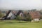 Old farm houses and barns in rural landscape