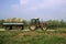 Old farm tractor with van