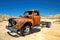 Old farm truck left in ghost town in the desert