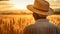 Old Farmer with Straw Hat Watches a Wheat Field at Dawn - Generative Ai
