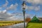 Old farmhouse and old lamppost at the Zaanse Scxhans  Koog aan de Zaan  Holland