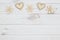 Old fashion love background with wooden hearts and flowers