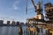 Old fashion rusty Port grain elevator. Industrial sea trading port bulk cargo zone in Rotterdam harbour