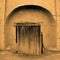 An old fashion wooden door in traditional village