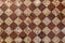 Old fashioned antique brown beige floor tiles