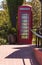 Old fashioned antique classic red phone booth