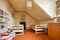 Old fashioned Attic bedroom with twin beds