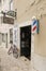 Old-fashioned barber shop with barber shop pole in Alfama sector, Lisbon